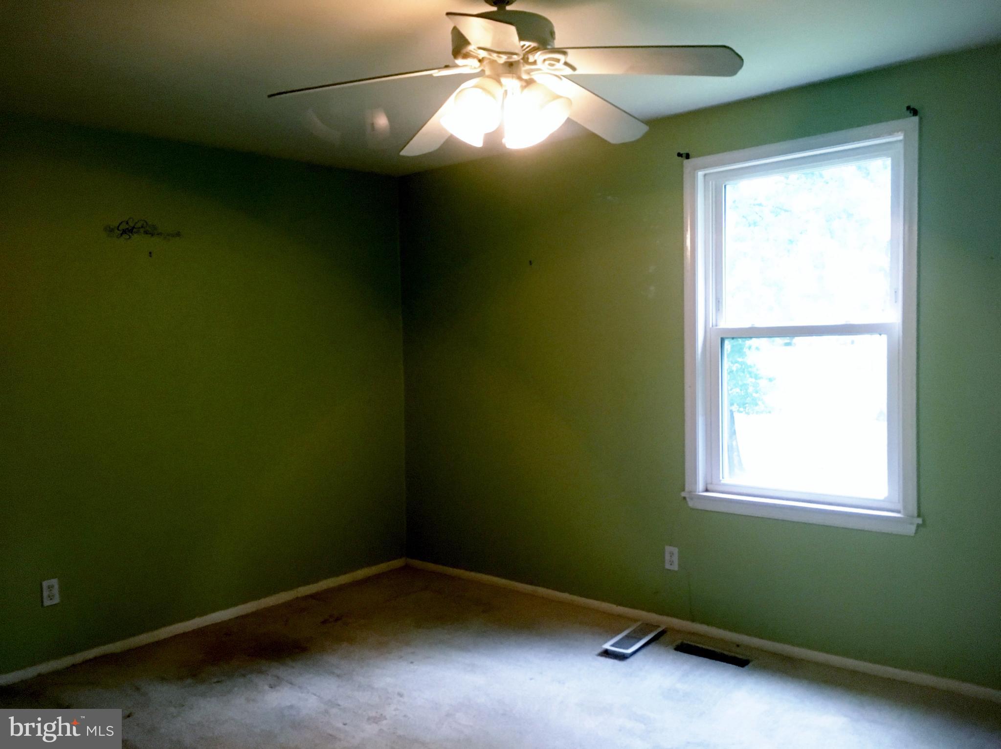 3714 Mayberry Avenue, Unit E Baltimore, MD 21206 - Photo 19 of 24 a room with a window and ceiling fan