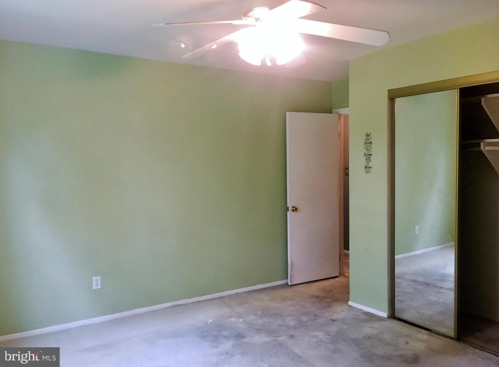 3714 Mayberry Avenue, Unit E Baltimore, MD 21206 - Photo 20 of 24 an empty room with closet and a bathroom