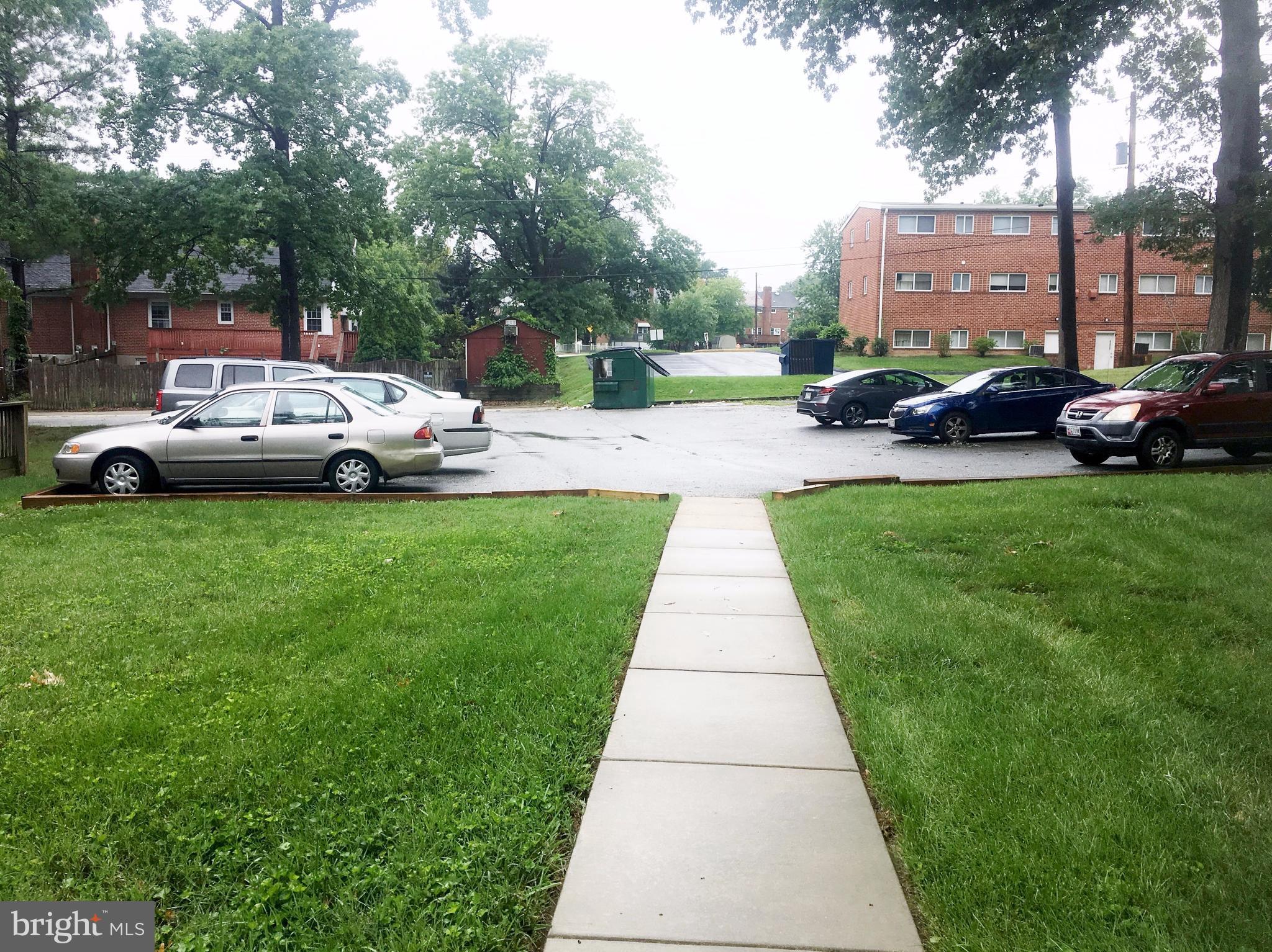 3714 Mayberry Avenue, Unit E Baltimore, MD 21206 - Photo 3 of 24 a view of a garden with cars