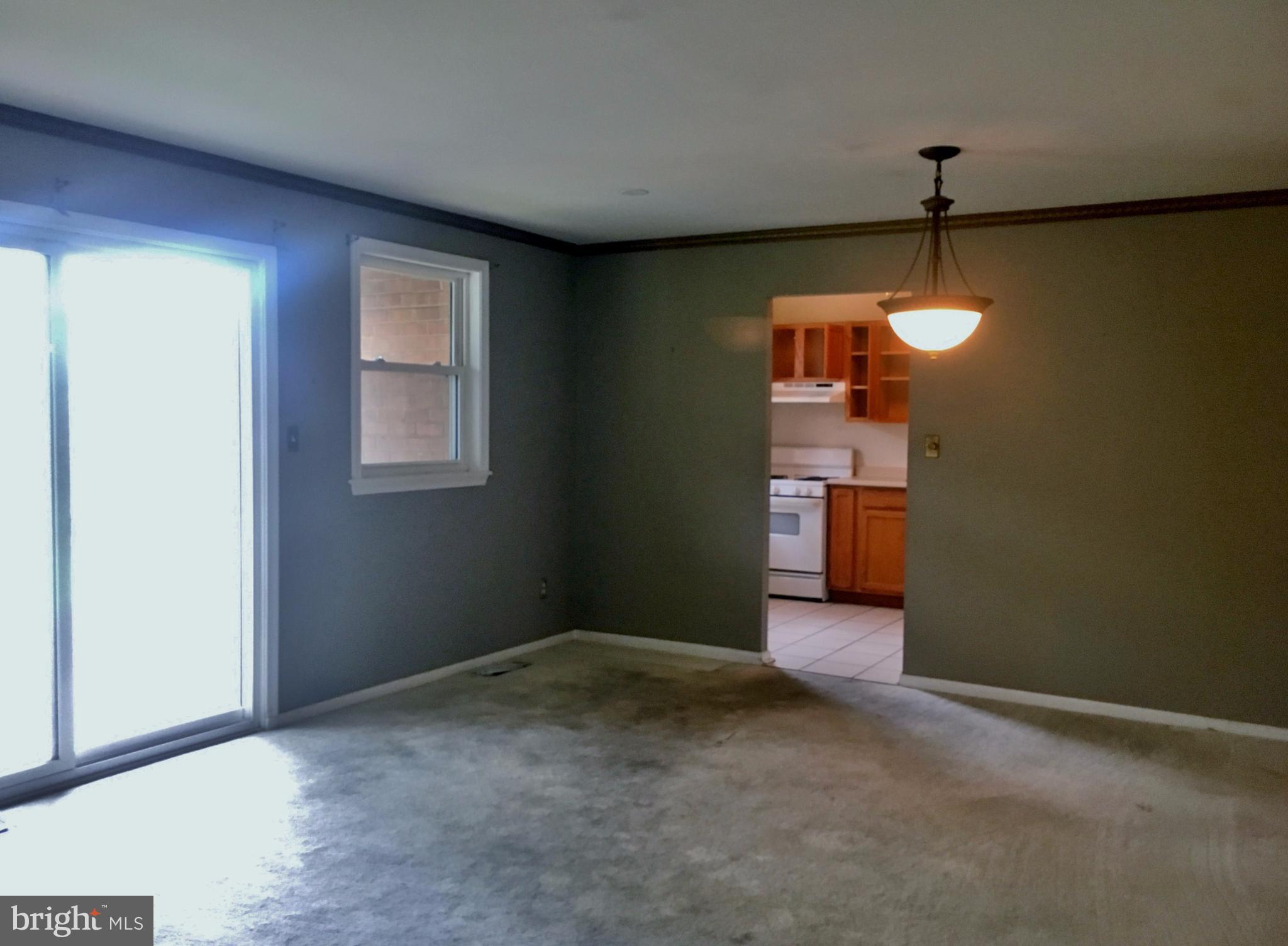 3714 Mayberry Avenue, Unit E Baltimore, MD 21206 - Photo 8 of 24 a furnished livingroom with window