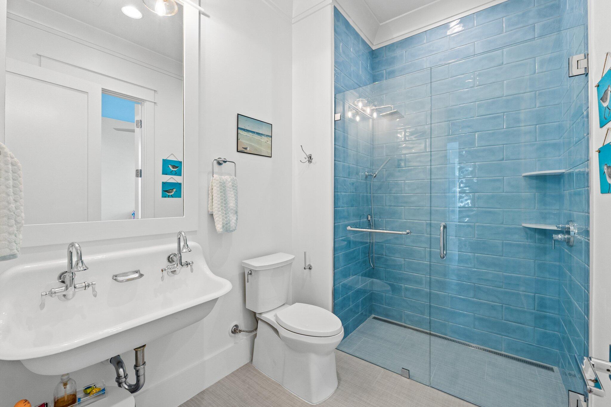 479 Ridge Road Santa Rosa Beach, FL 32459 - Photo 21 of 45 a bathroom with a sink toilet and shower