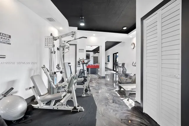 a view of a room with gym equipment