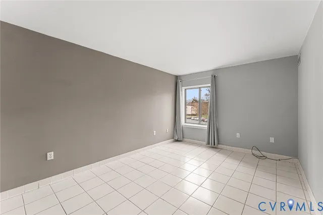 a view of an empty room and window