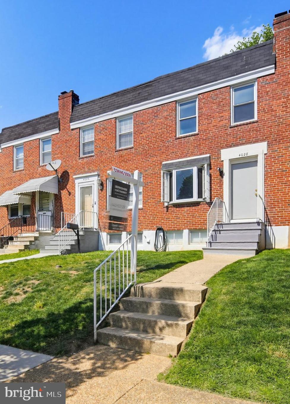 Charming brick townhome with curb appeal.