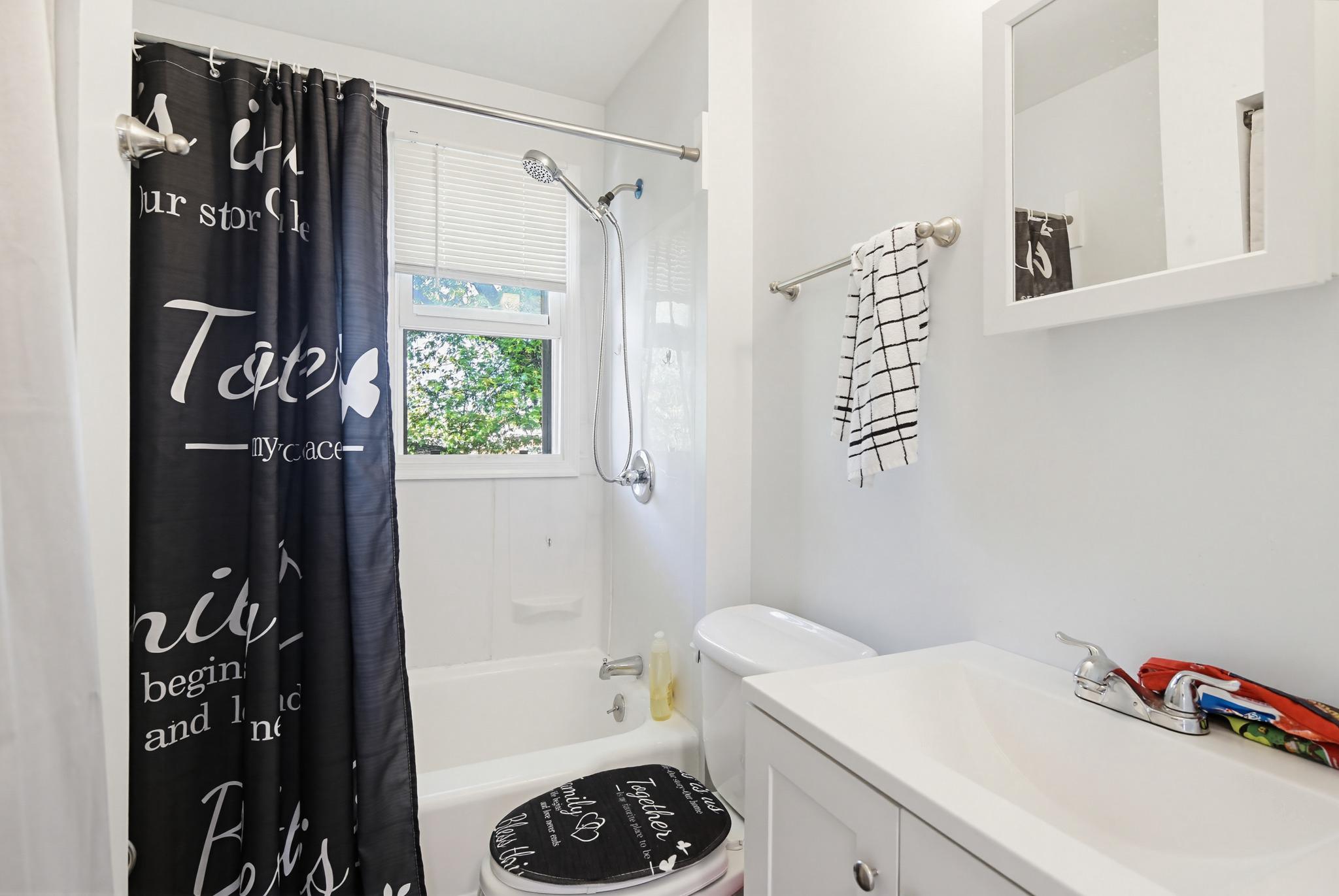 4028 Raymonn Avenue Baltimore, MD 21213 - Photo 15 of 36 Chic 2nd floor full bathroom with modern accents.