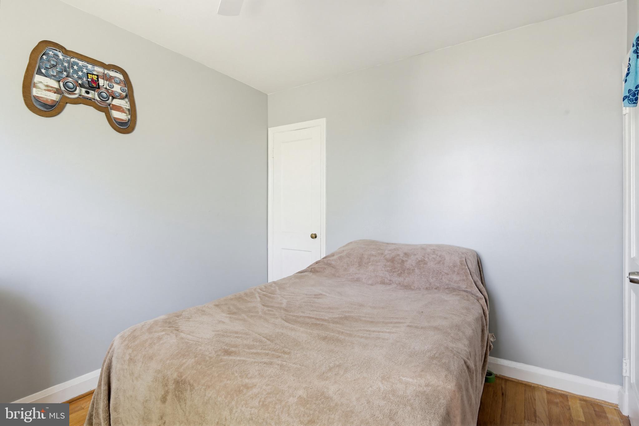 4028 Raymonn Avenue Baltimore, MD 21213 - Photo 18 of 36 Cozy bedroom with a calming vibe.