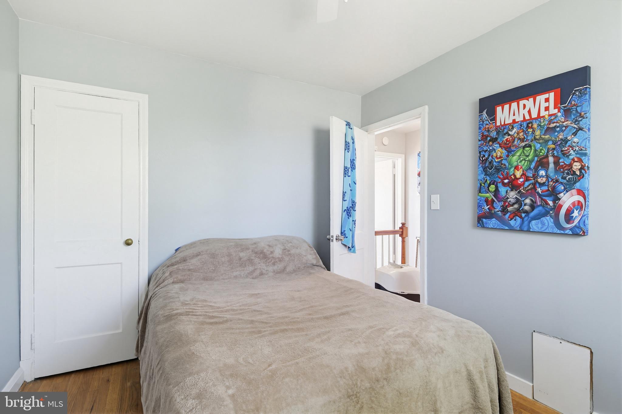 4028 Raymonn Avenue Baltimore, MD 21213 - Photo 19 of 36 Charming bedroom with superhero flair.