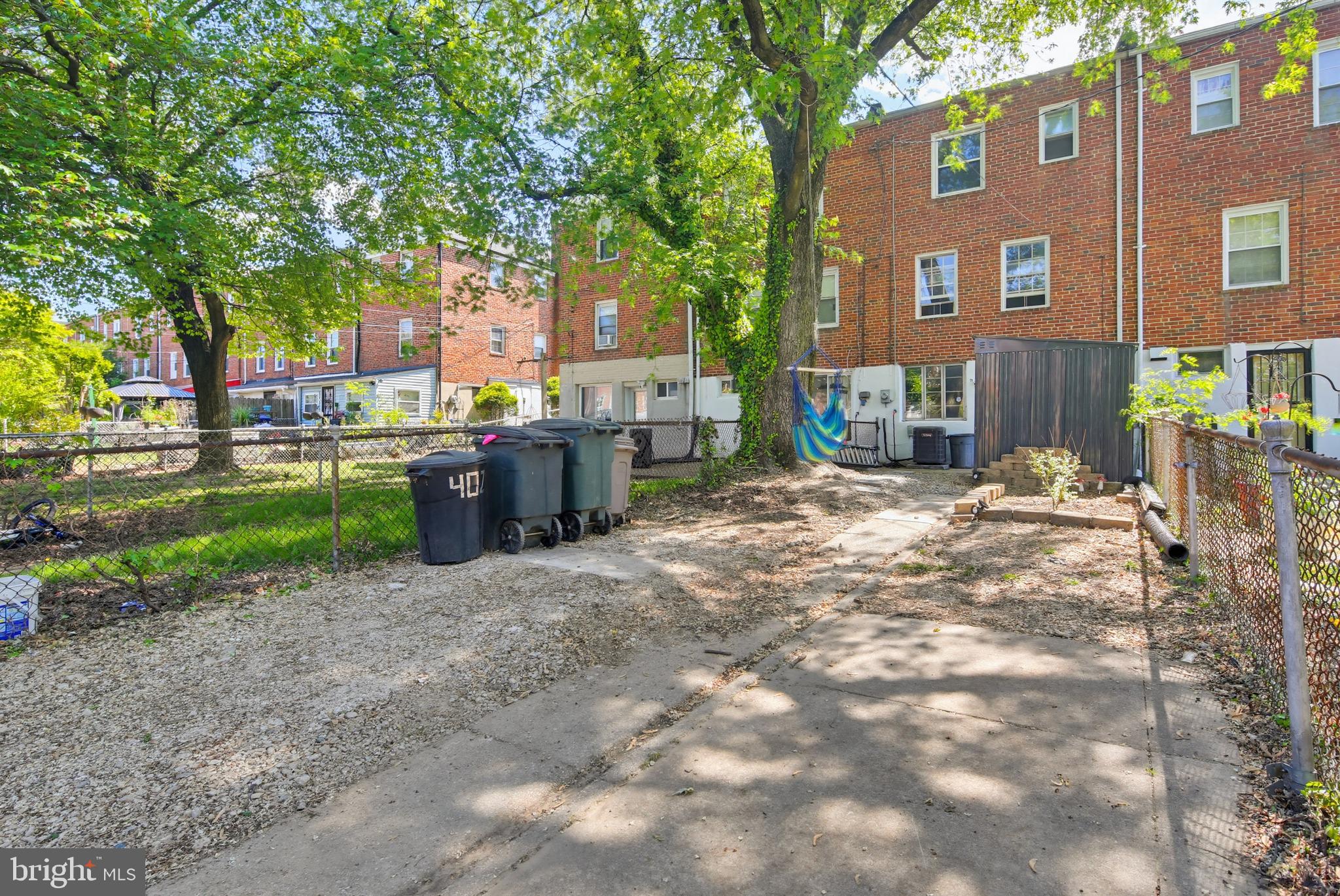 4028 Raymonn Avenue Baltimore, MD 21213 - Photo 29 of 36 Spacious backyard with lush greenery.