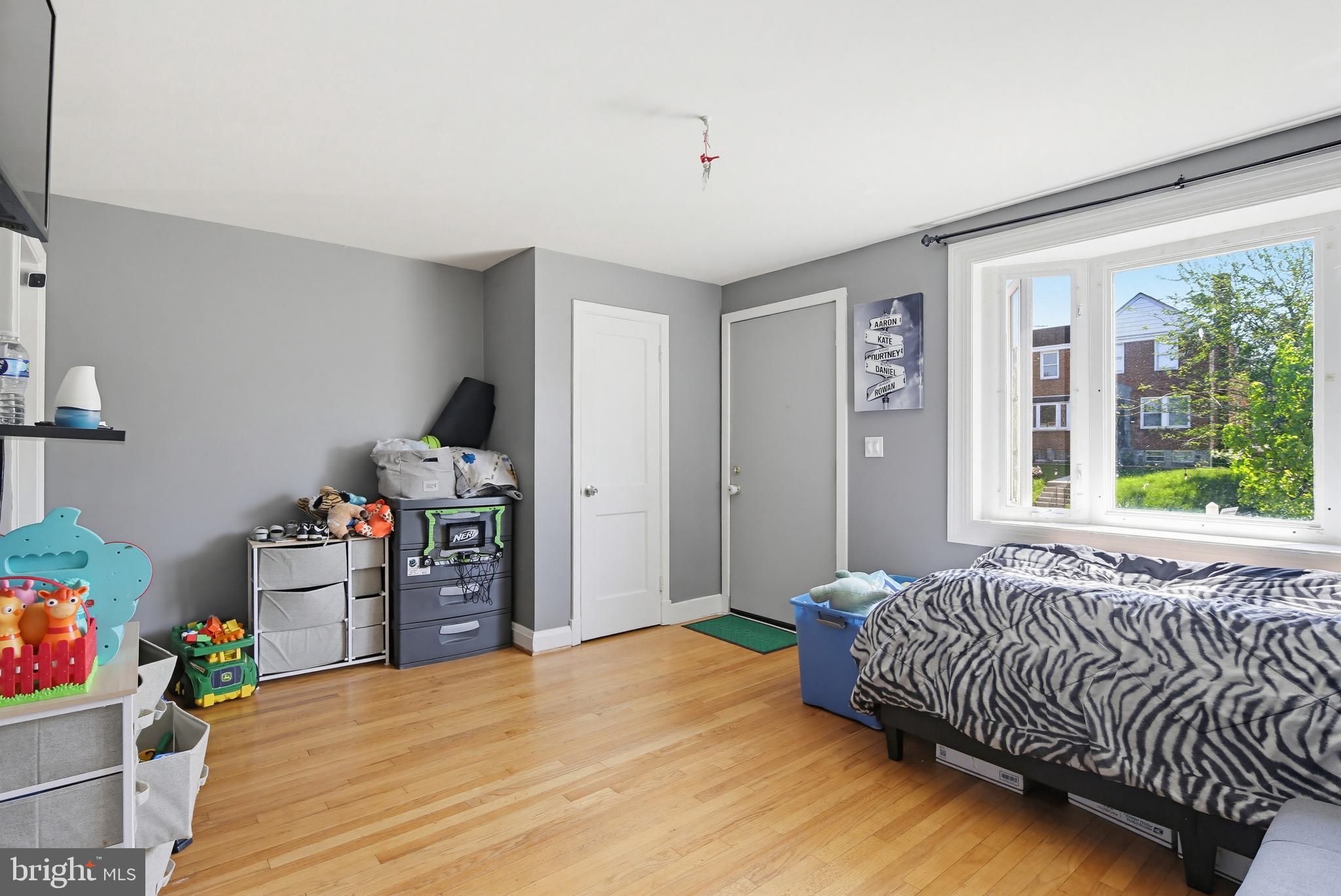 4028 Raymonn Avenue Baltimore, MD 21213 - Photo 7 of 36 Bright and airy bedroom retreat.