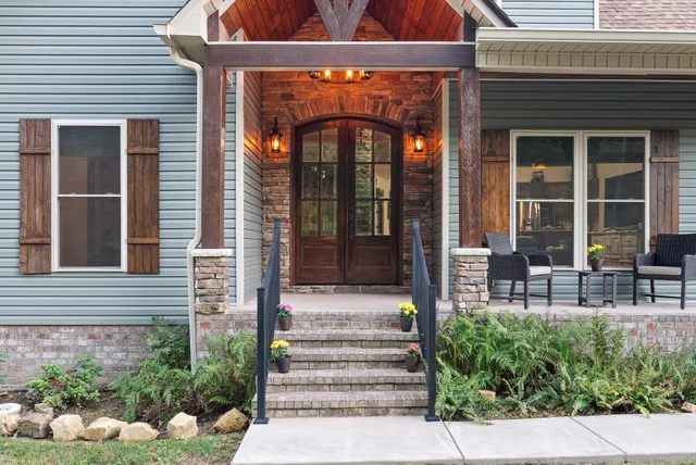 a large kitchen with a table and chairs