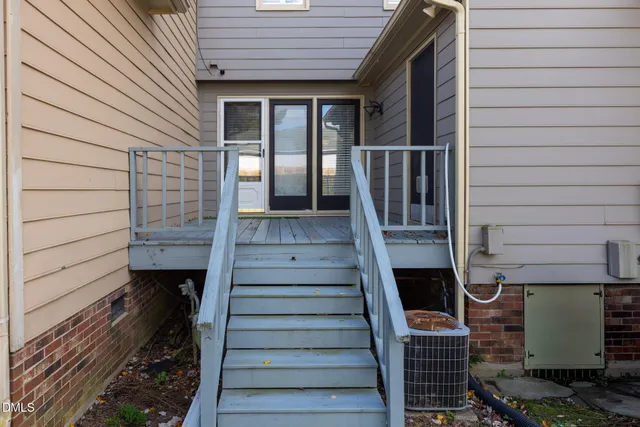 a view of a glass door with a balcony