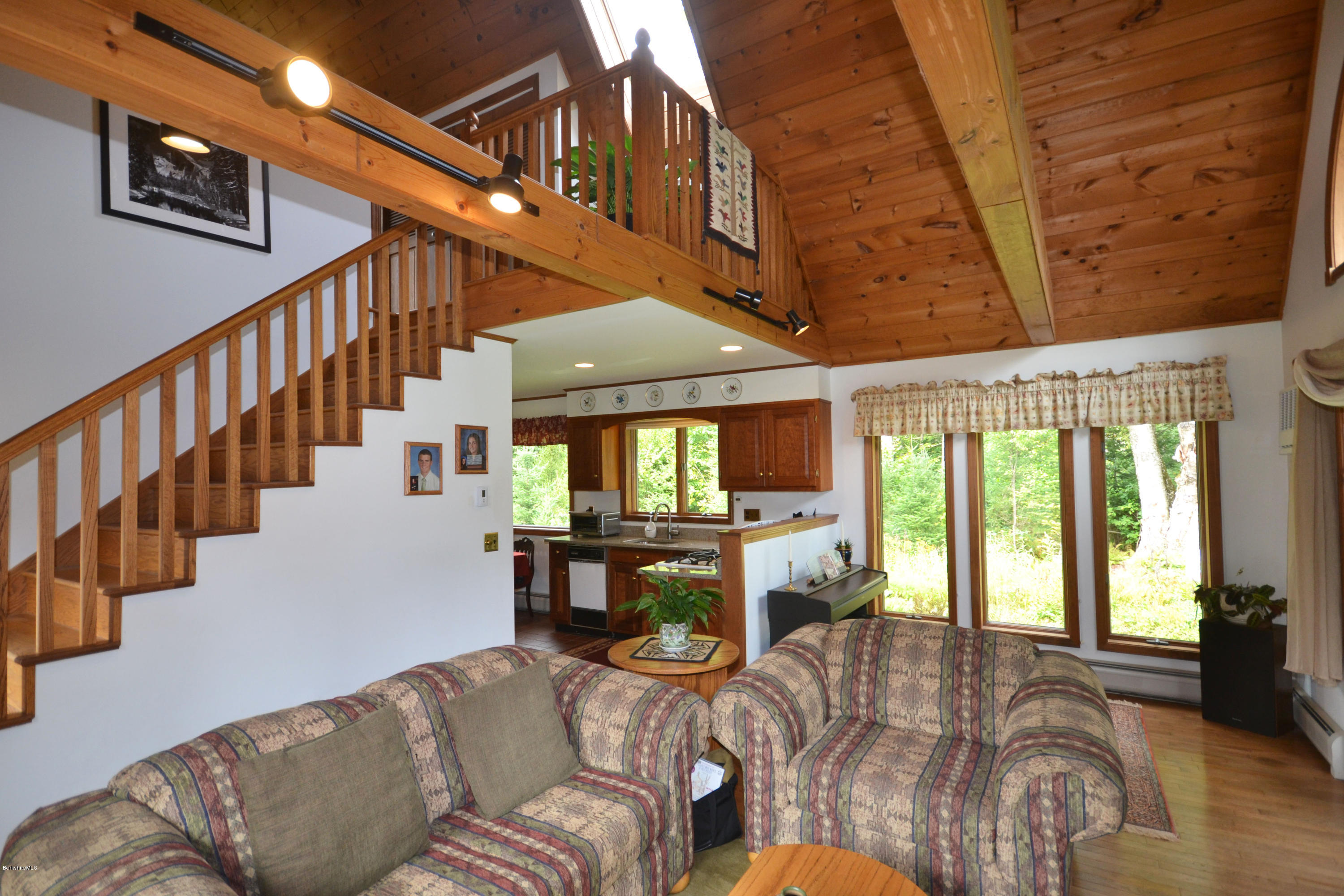 18 Baumann Road Peru, MA 01235 - Photo 11 of 52 a living room with furniture fireplace and a large window