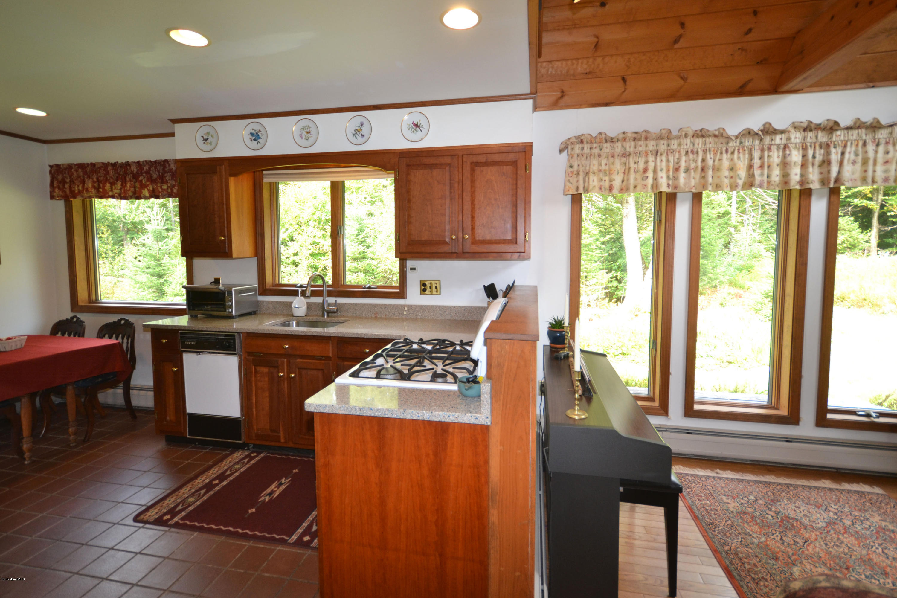 18 Baumann Road Peru, MA 01235 - Photo 12 of 52 a kitchen with stainless steel appliances granite countertop sink stove top oven and cabinets