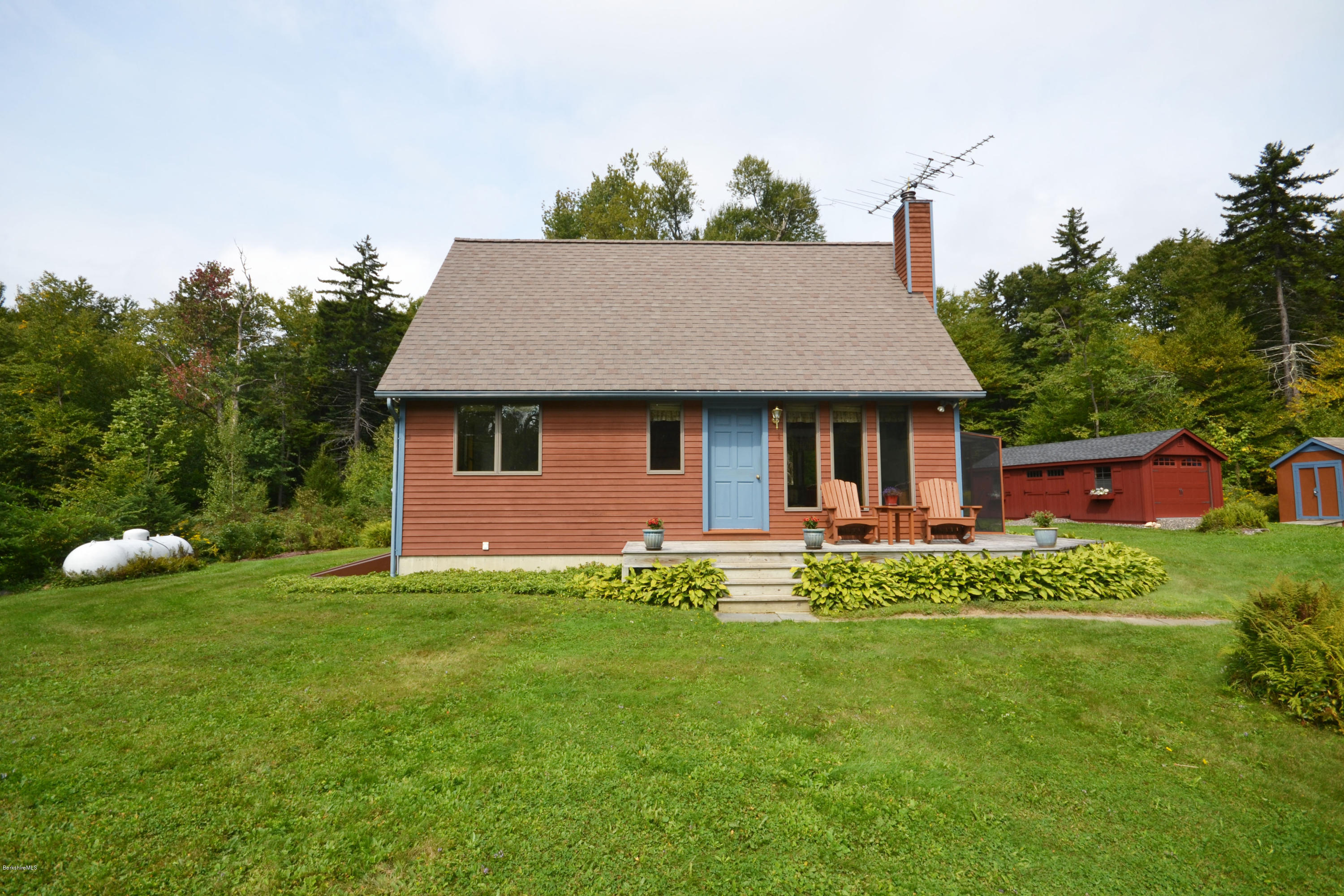 18 Baumann Road Peru, MA 01235 - Photo 3 of 52 a front view of a house with garden