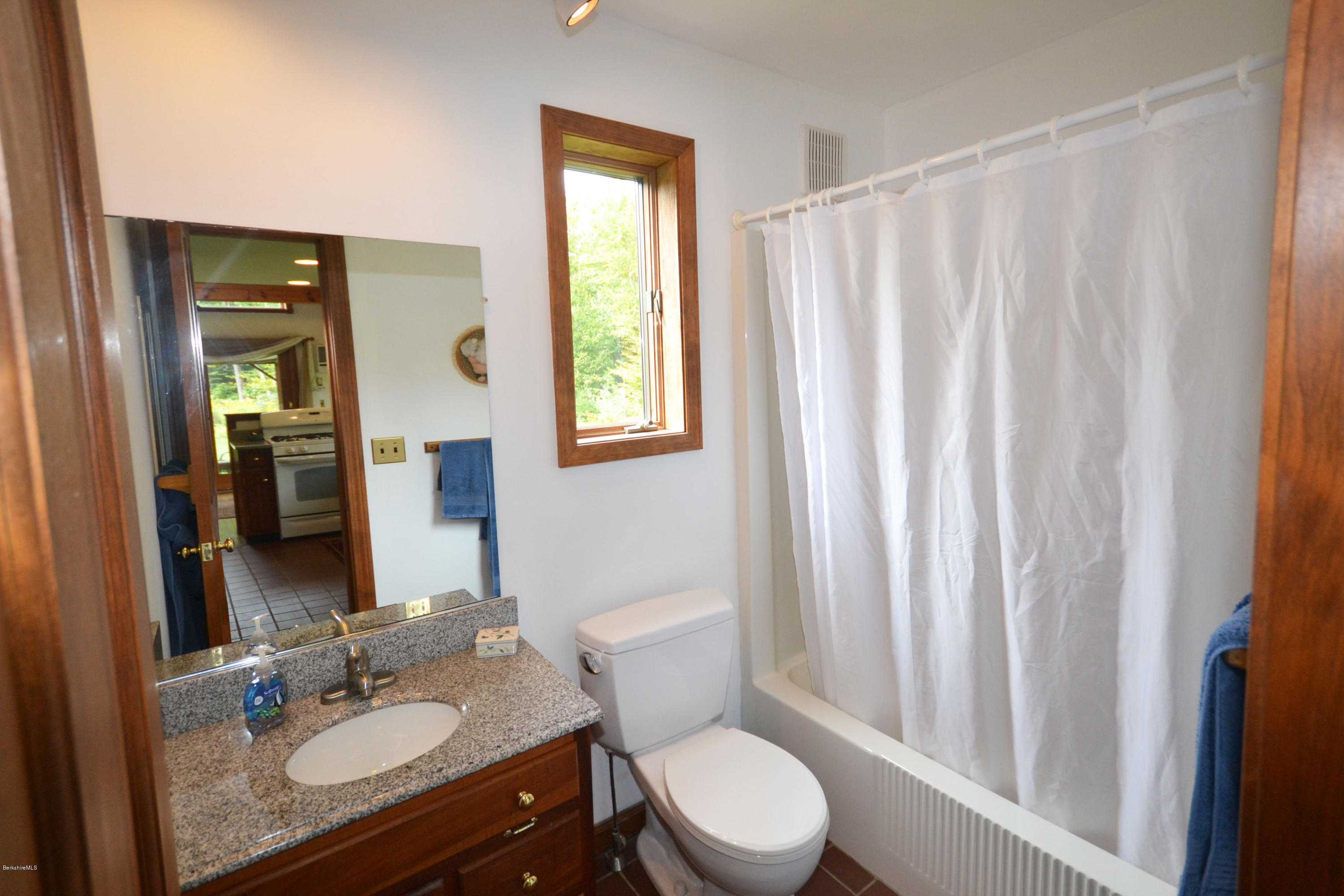 18 Baumann Road Peru, MA 01235 - Photo 21 of 52 a bathroom with a granite countertop sink toilet and mirror