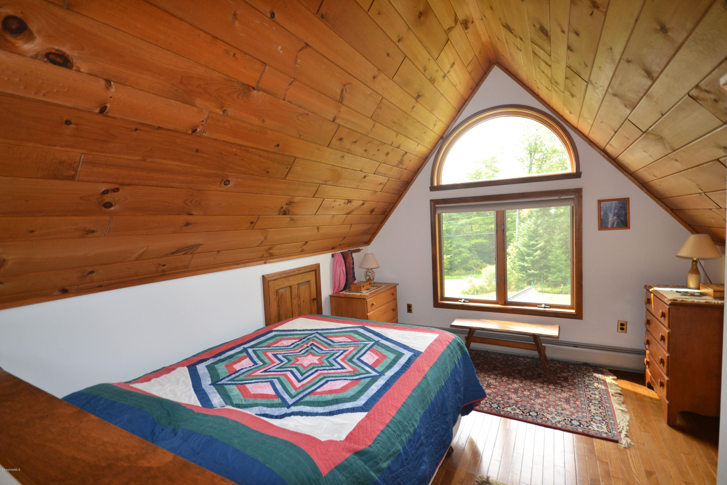 18 Baumann Road Peru, MA 01235 - Photo 25 of 52 a bedroom with a bed next to a window