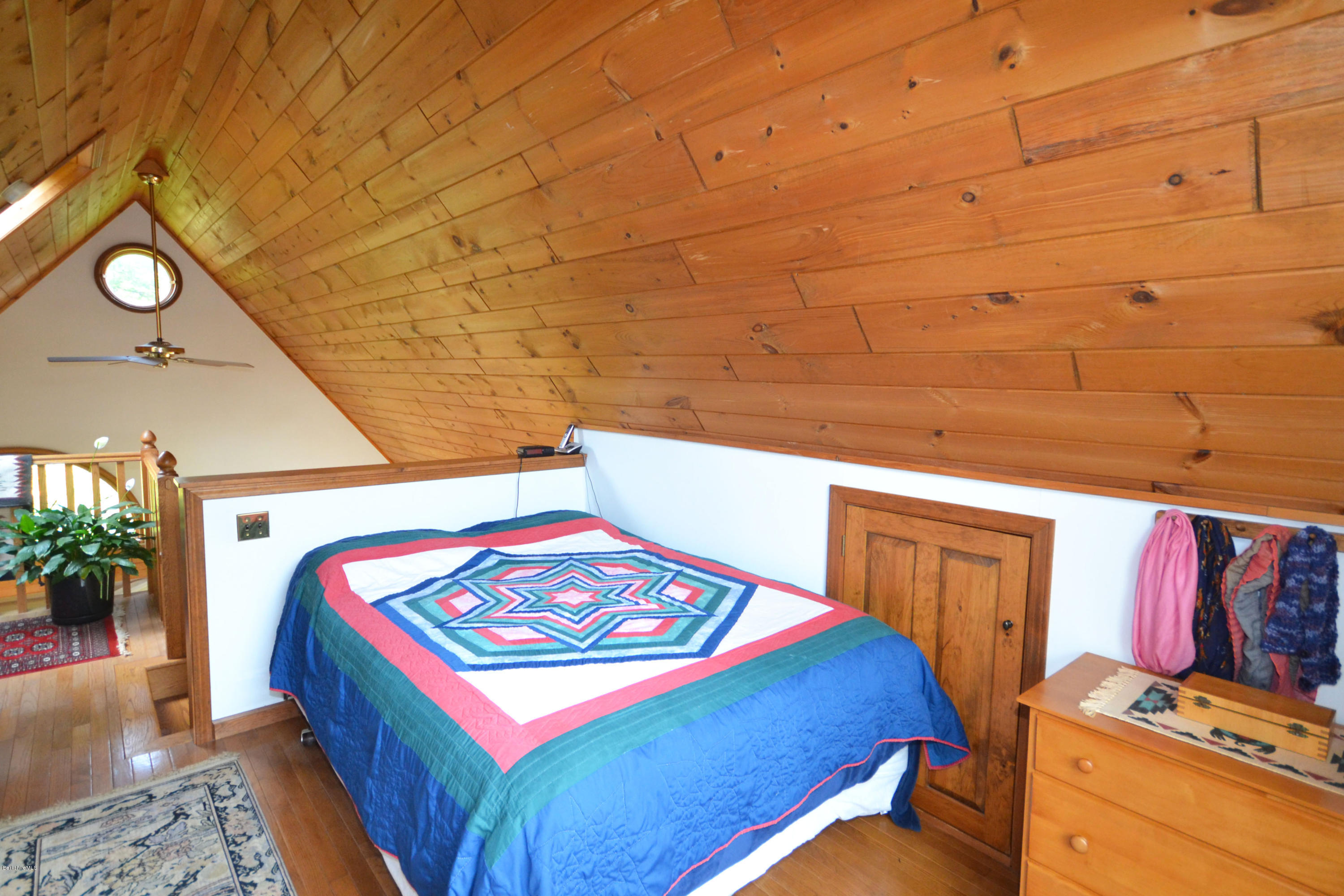 18 Baumann Road Peru, MA 01235 - Photo 27 of 52 a bedroom with a bed and a dresser