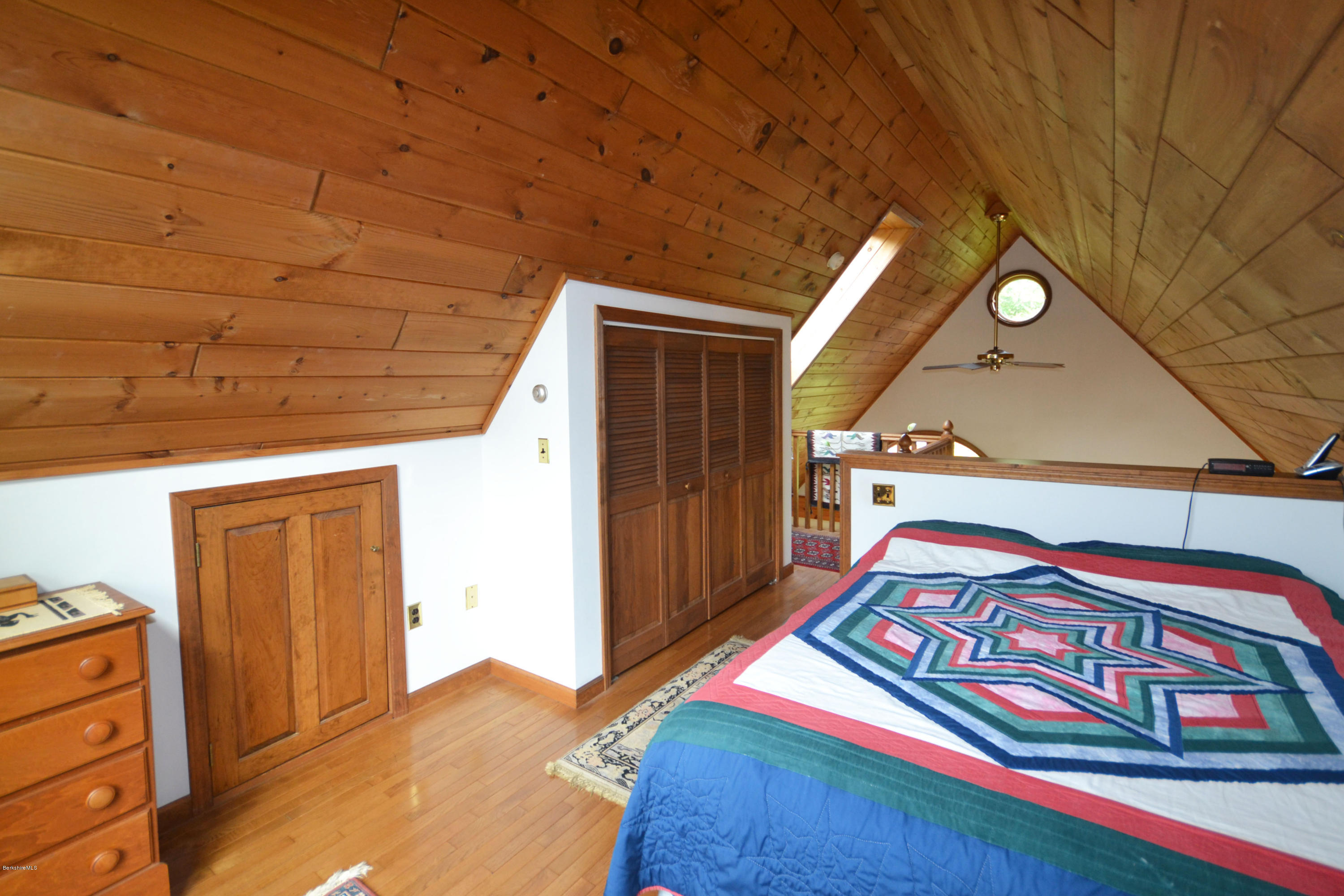 18 Baumann Road Peru, MA 01235 - Photo 28 of 52 a bedroom with a bed and a dresser