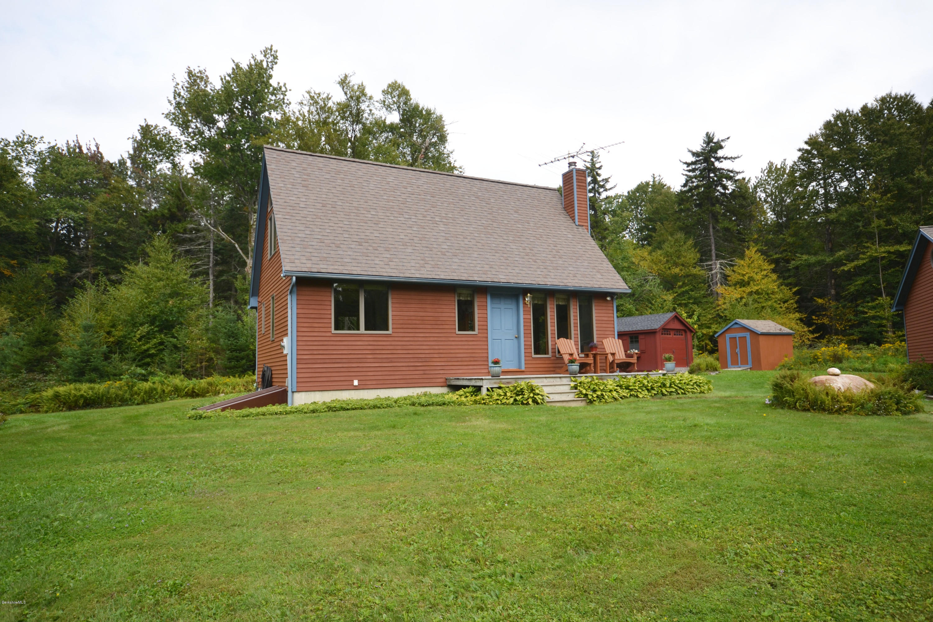 18 Baumann Road Peru, MA 01235 - Photo 5 of 52 a front view of a house with garden