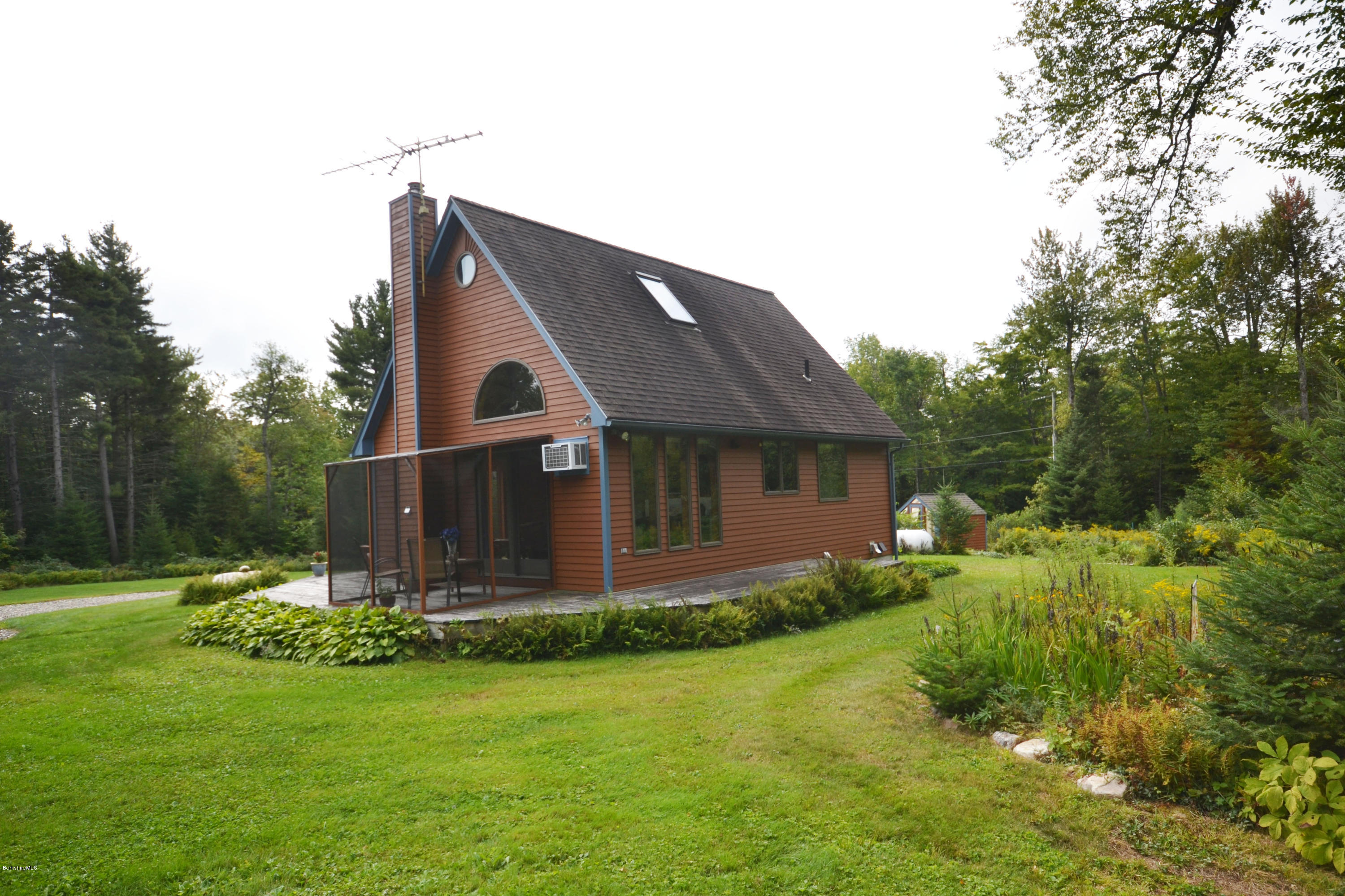 18 Baumann Road Peru, MA 01235 - Photo 41 of 52 a front view of house with a garden