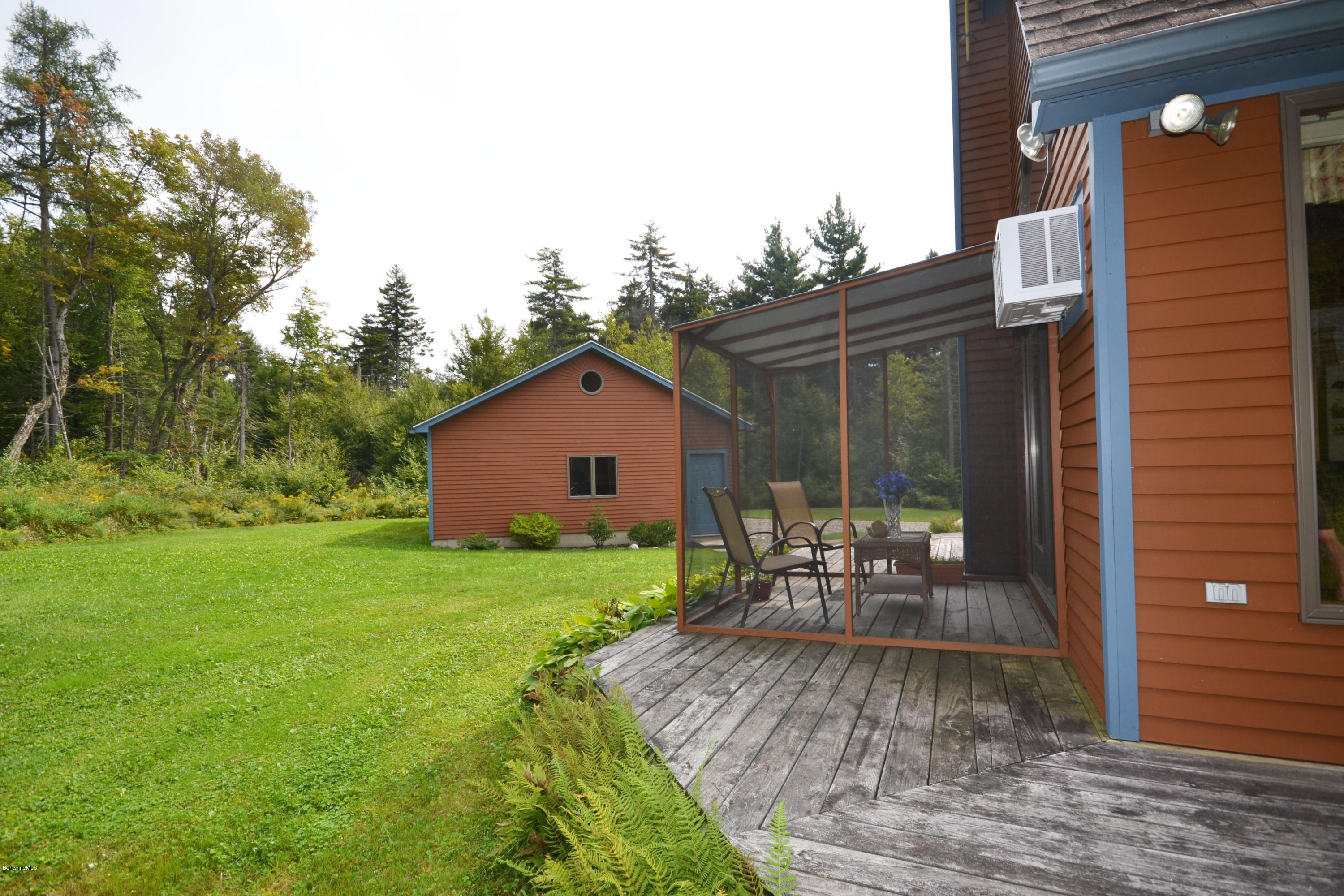18 Baumann Road Peru, MA 01235 - Photo 43 of 52 a view of a chair and table in backyard of the house