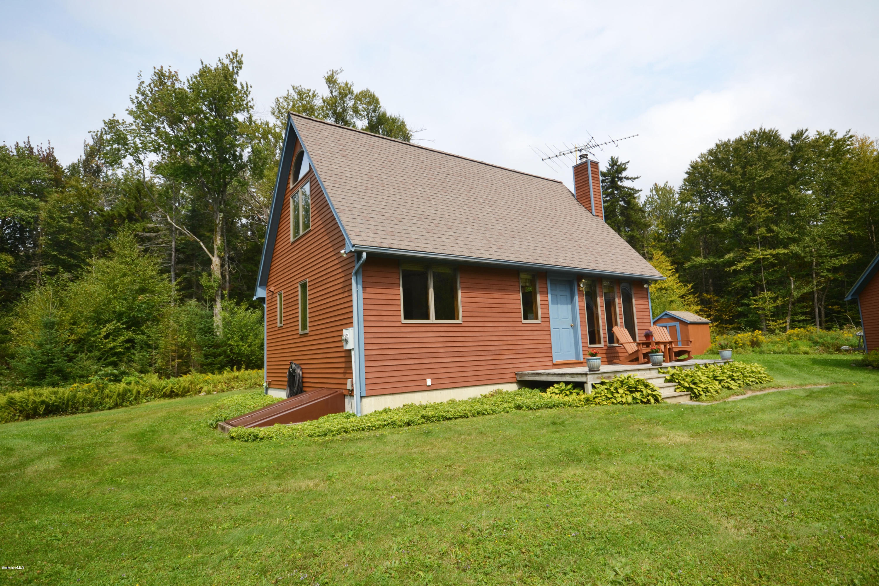 18 Baumann Road Peru, MA 01235 - Photo 6 of 52 a front view of a house with a yard