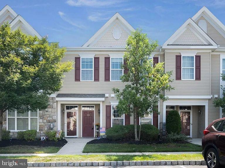 103 Raphael Court Williamstown, NJ 08094 - Photo 1 of 25 a front view of a house with garden