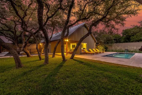 a view of backyard with green space