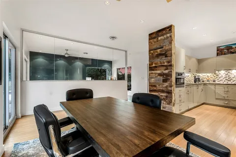 a living room with furniture and flat screen tv