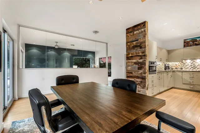 a living room with furniture and flat screen tv