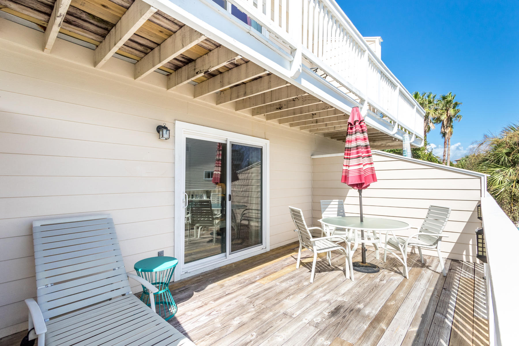 191 Blue Mountain Road, Unit 202 Santa Rosa Beach, FL 32459 - Photo 3 of 31 a patio with table and chairs