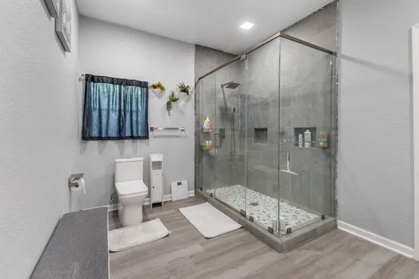 a room with furniture and a flat screen tv