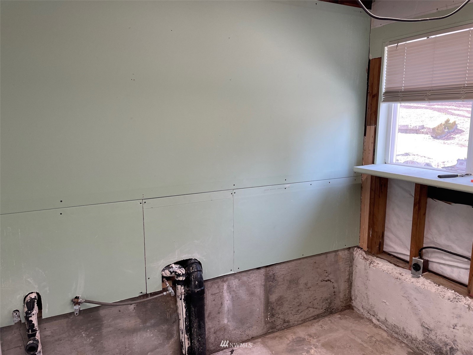 22020 5th Avenue West Bothell, WA 98021 - Photo 7 of 12 a view of storage and utility room with window