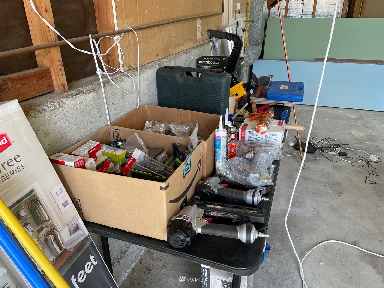 22020 5th Avenue West Bothell, WA 98021 - Photo 8 of 12 a living room with furniture and a flat screen tv