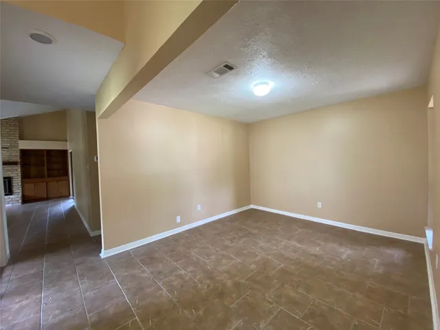 a view of hallway with seating area