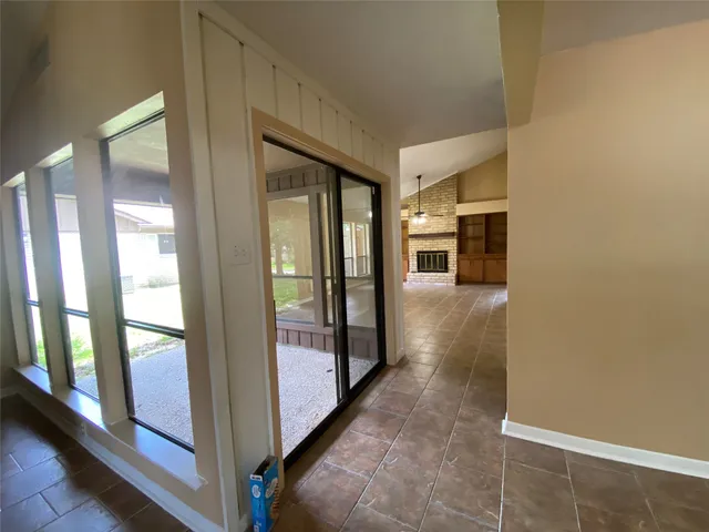 a view of a hallway with entryway
