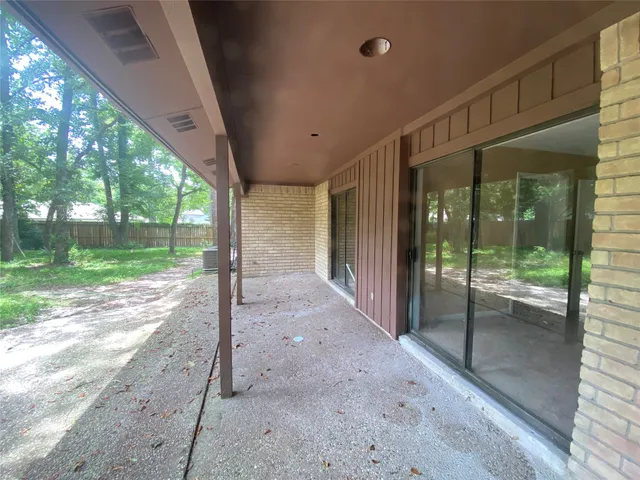 a view of a back yard of the house