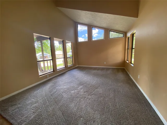 a kitchen with stainless steel appliances a sink and a refrigerator