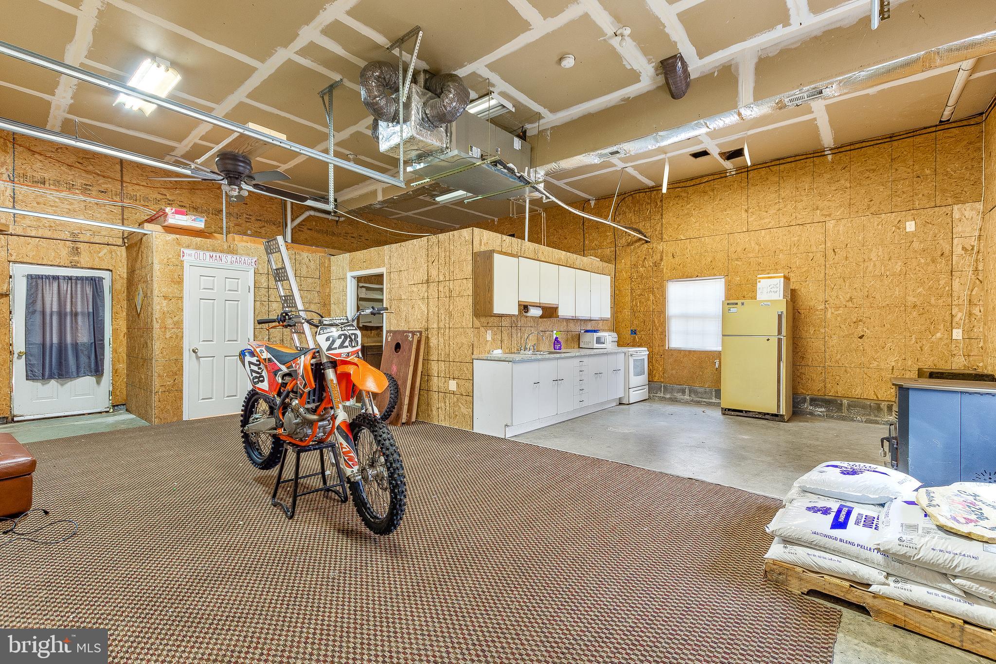2135 Oak Road Port Republic, MD 20676 - Photo 22 of 32 Lower level/Oversized garage w/ Kitchenette