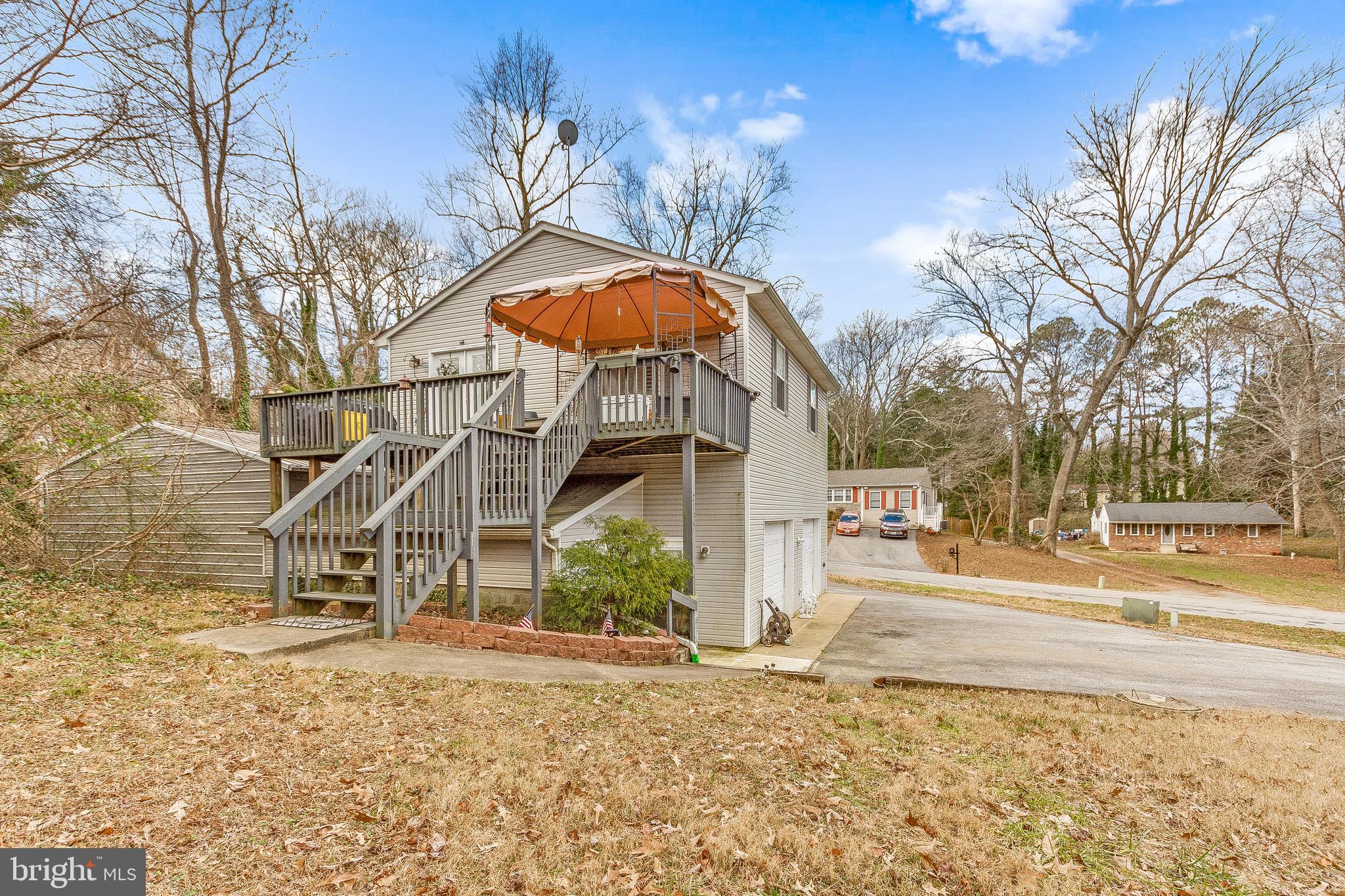 2135 Oak Road Port Republic, MD 20676 - Photo 4 of 32 Large side porch leads to apartment