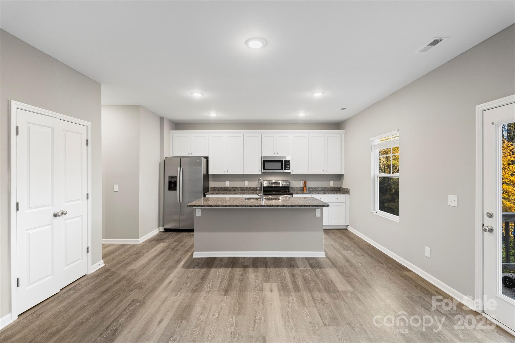 265 Prospect Trail Salisbury, NC 28147 - Photo 16 of 44 a view of kitchen with sink microwave and refrigerator