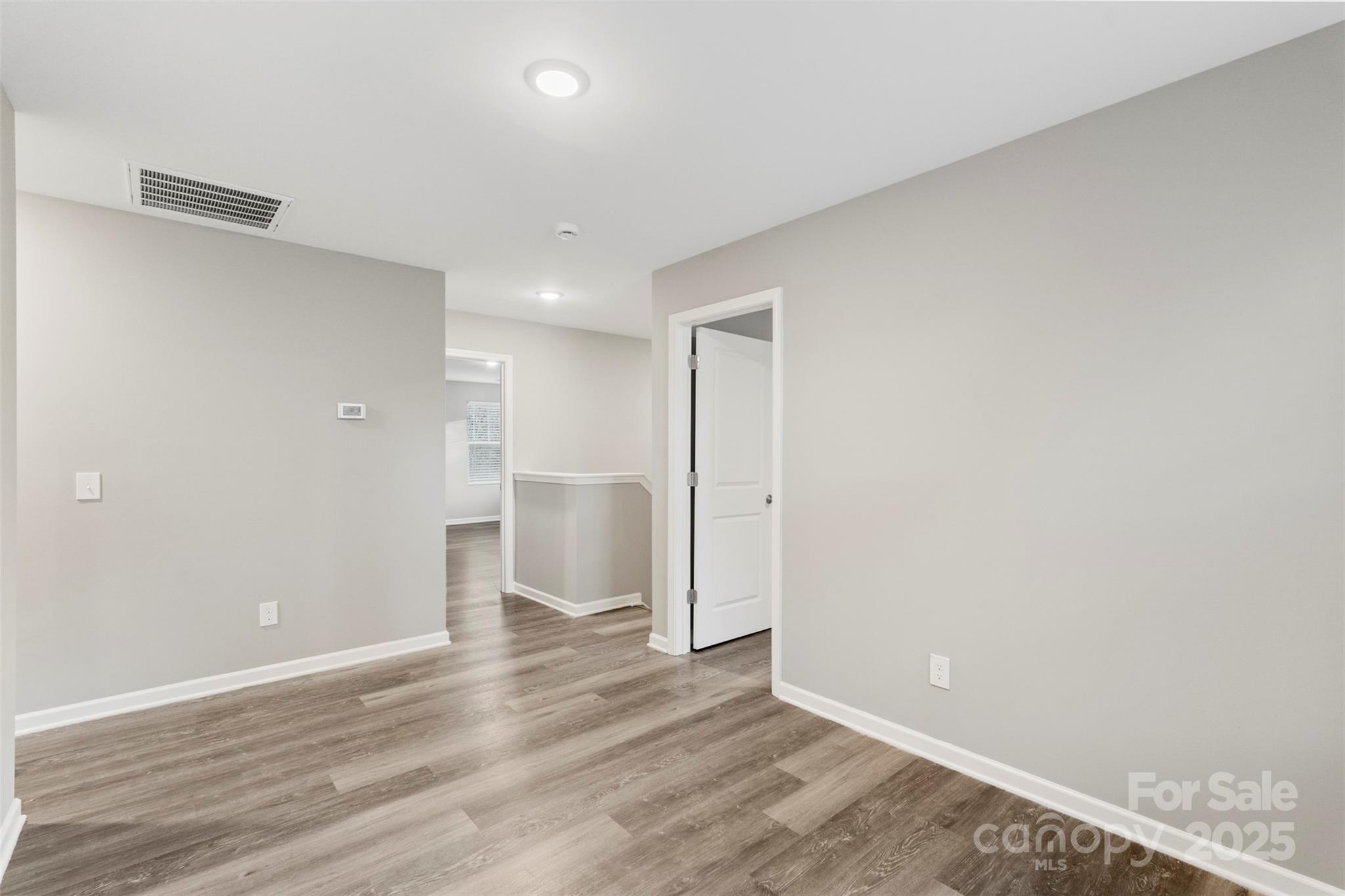 265 Prospect Trail Salisbury, NC 28147 - Photo 24 of 44 a view of empty room with wooden floor