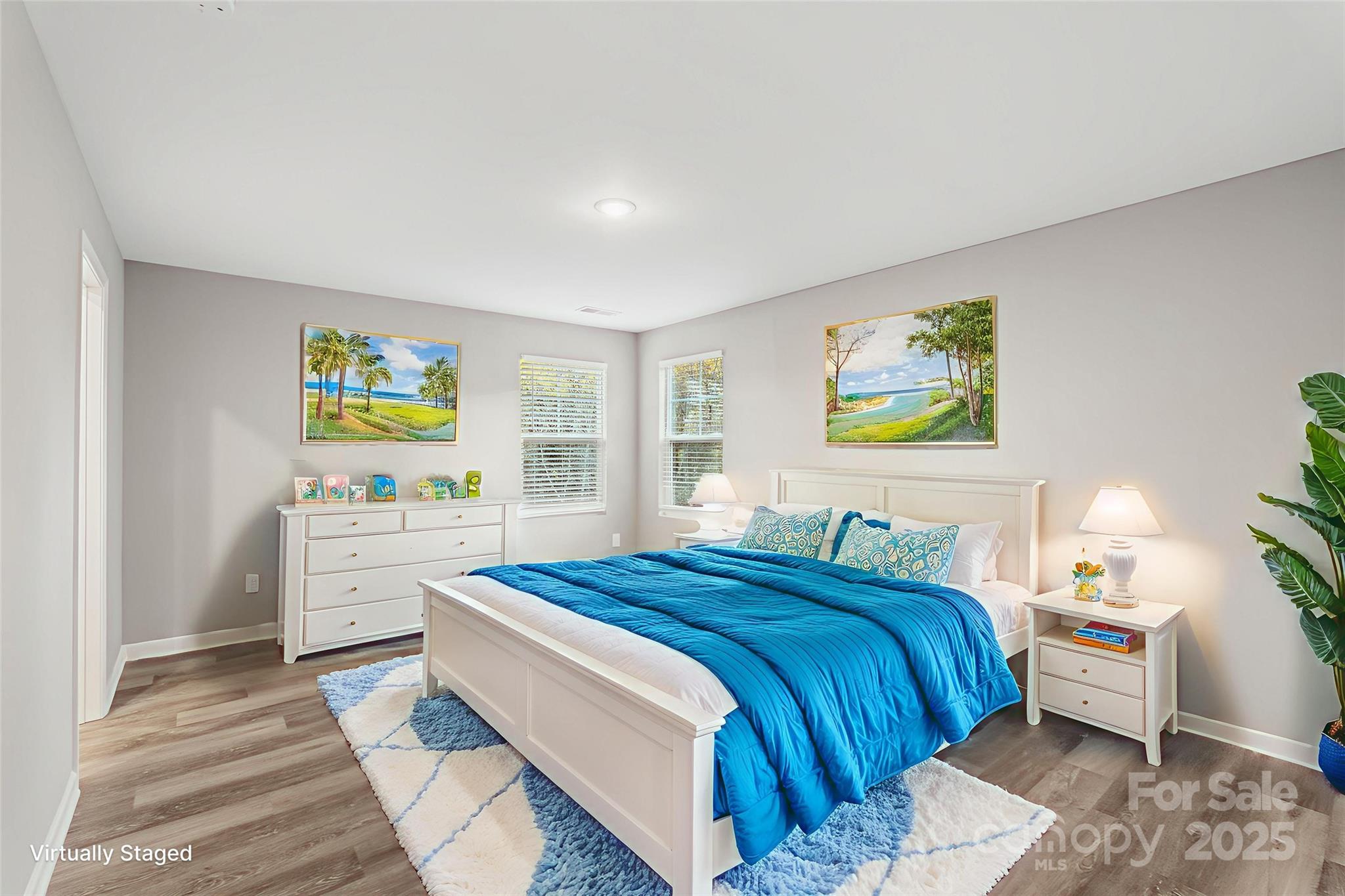 265 Prospect Trail Salisbury, NC 28147 - Photo 26 of 44 a bedroom with a bed and painting on the wall