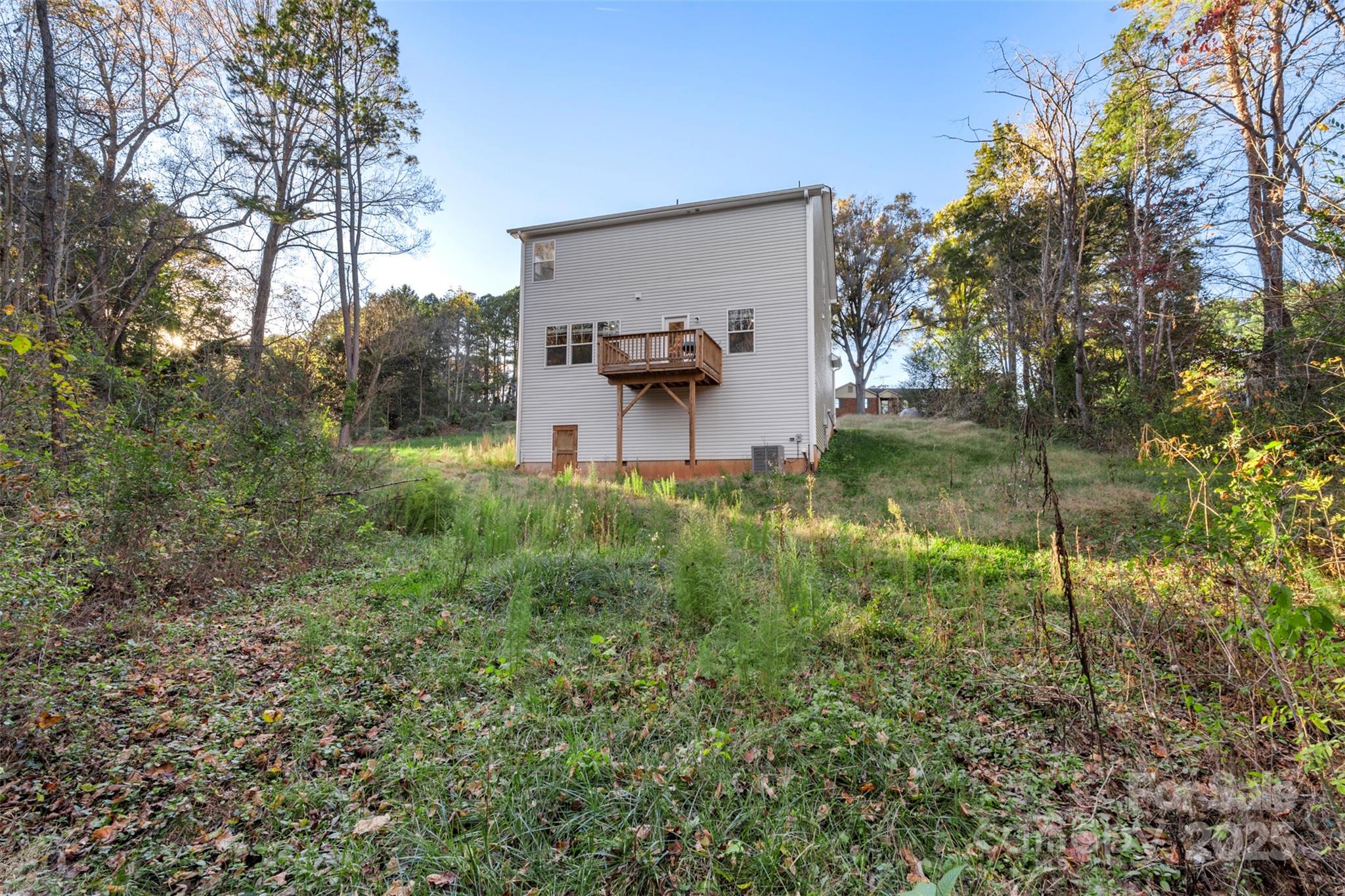 265 Prospect Trail Salisbury, NC 28147 - Photo 44 of 44 a backyard of a house with table and chairs
