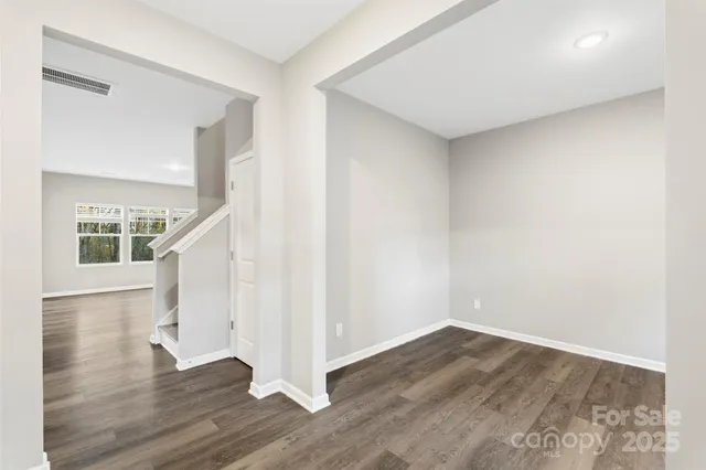 a view of entryway with wooden floor