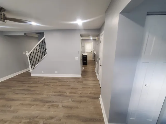 a view of a hallway view with staircase