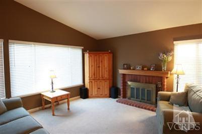 13670 Laurelhurst Road Moorpark, CA 93021 - Photo 3 of 12 a living room with furniture and a fireplace