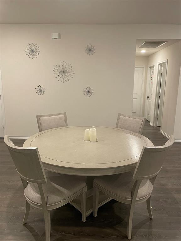 468 Unbridled Road Waxahachie, TX 75165 - Photo 5 of 10 a view of a dining room with furniture and wooden floor