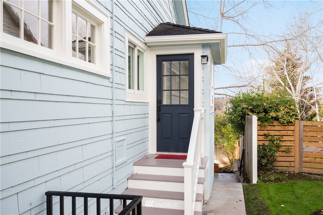 3135 37th Place South Seattle, WA 98144 - Photo 11 of 31 a front view of a house with a garden