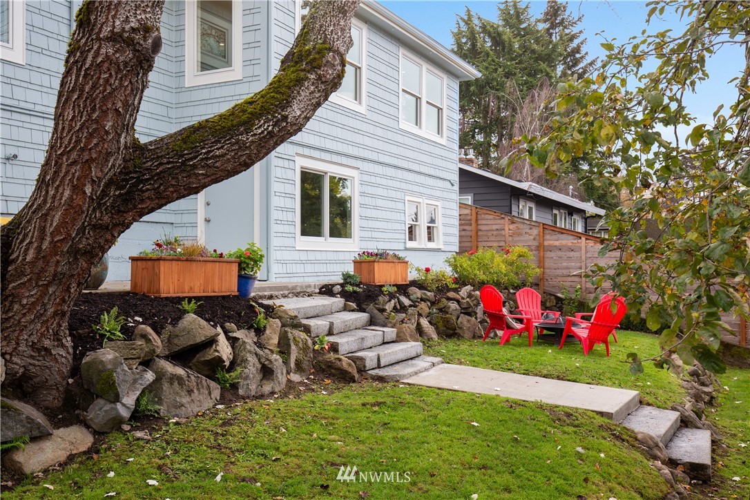3135 37th Place South Seattle, WA 98144 - Photo 28 of 31 a view of a house with backyard and sitting area